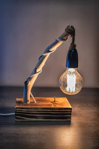 Unique handmade table lamp from driftwood and vintage bulb light