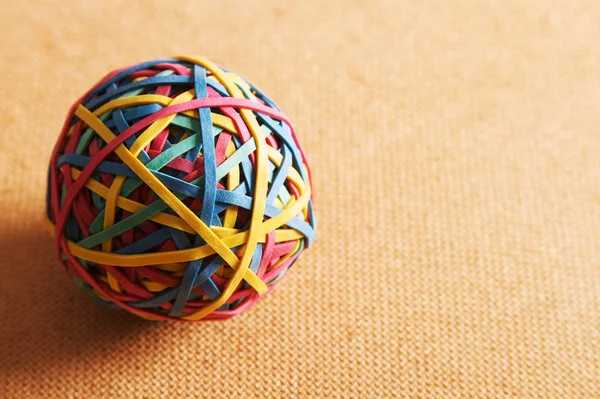 A rubber band ball office supply.