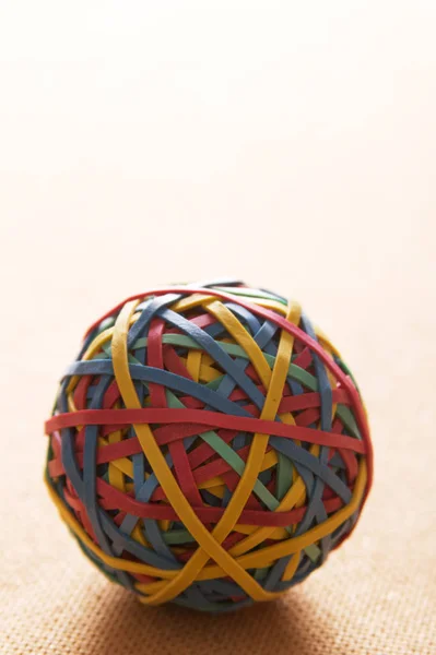 A rubber band ball office supply.