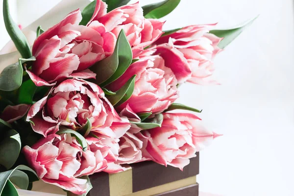 Floral background with copy space. Flowers in bloom.Close-up beautiful bouquet of  tulips. Spring concept. Floral greeting card.
