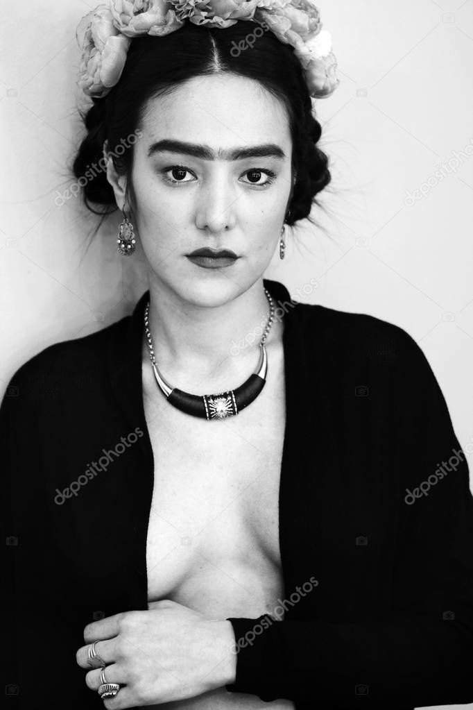 Image of a Mexican artist Frida Kahlo in a modern performance 