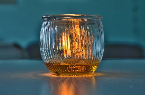 Side View Glass Candle Holder Revealing Burning Flame — Stock Photo, Image