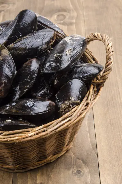 Fresh Uncleaned Mussels Wicker Basket Wooden Table — Stock Photo, Image