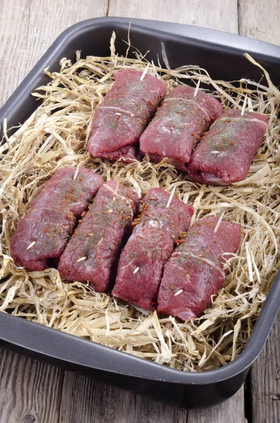 Rolled Braising Steaks Straw Close — Stock Photo, Image