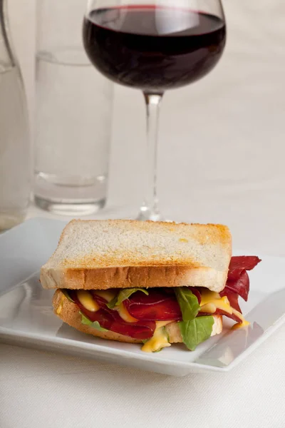 Ham Sandwich Bread Plate Wooden Board Wine — Stock Photo, Image