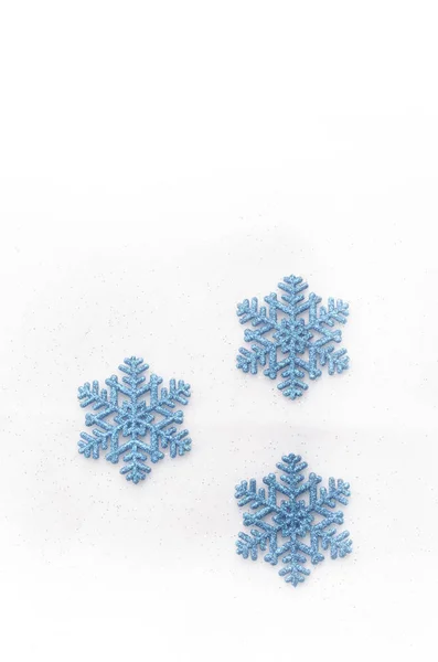 Blauw Glinsterende Sneeuwvlokken Lichte Achtergrond — Stockfoto