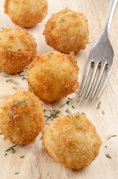 Fried Soft Potato Balls Thyme Fork Bright Wood — Stock Photo, Image