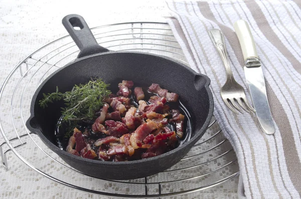 Grilled Bacon Bits Oil Thyme Cast Iron Pan — Stock Photo, Image
