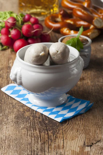bavarian white sausages in white bowl, close-up
