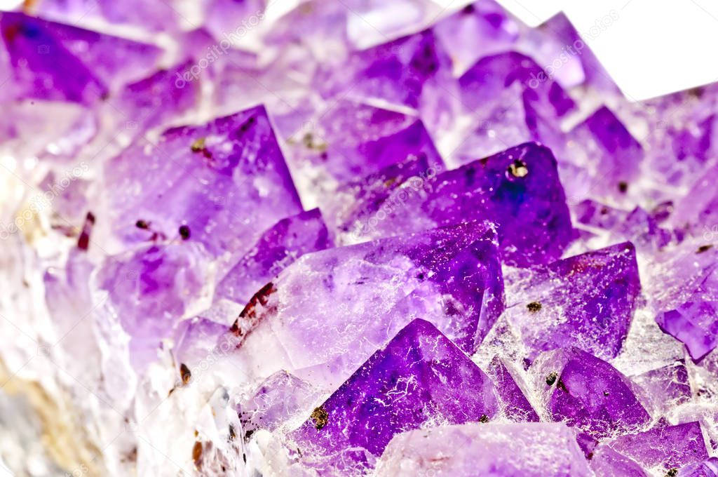 beautiful amethyst isolated on white background, close-up 