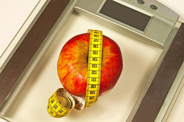 Bathroom Scales Measure Apple Stock Photo