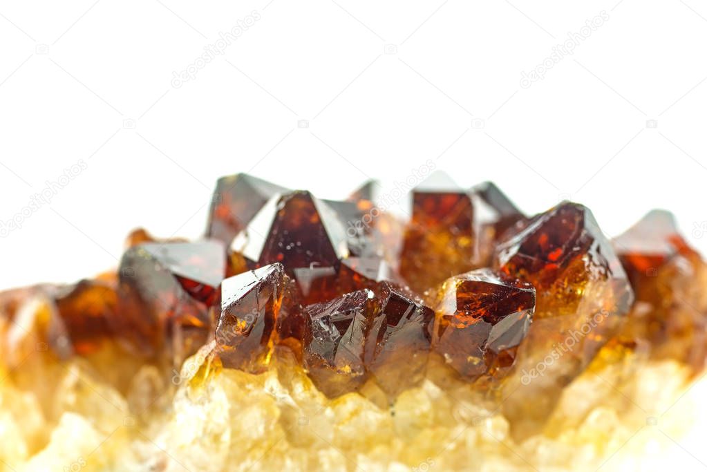 beautiful garnet crystals isolated on white background, close-up 