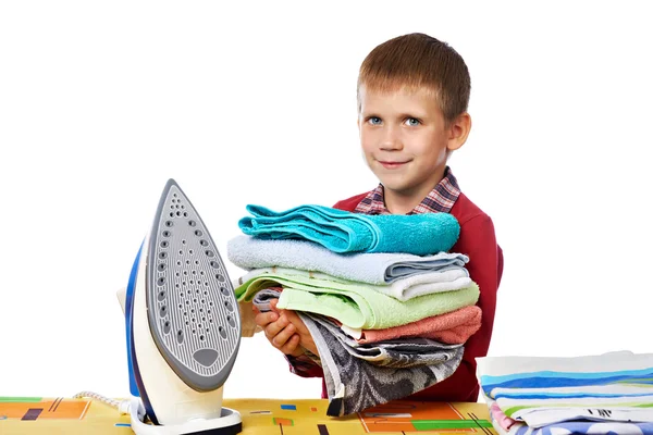 Niño con ropa de cama lavada y hierro aislado —  Fotos de Stock