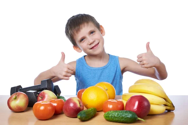 Glücklicher gesunder Junge mit Obst, Gemüse und Hanteln isoliert — Stockfoto