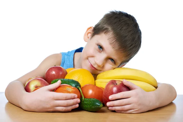 Happy healthy boy with fruits and vegetables isolated — Stock Photo, Image