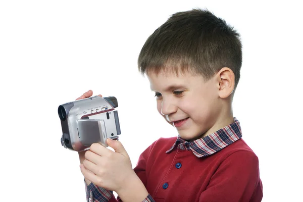 Мальчик с изолированной видеокамерой — стоковое фото