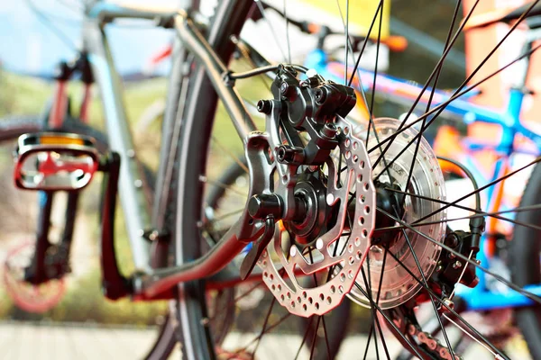 Brake disk of sport mountain bike in shop — Stock Photo, Image