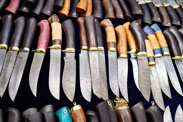 Forged hunting knives on dark — Stock Photo, Image