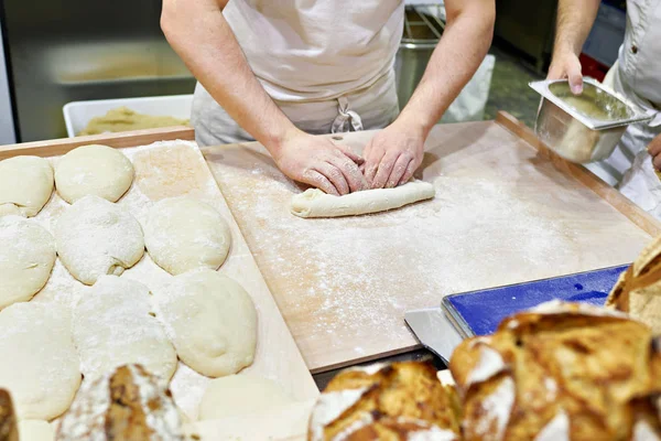 Kneading dough in bakery — Stock Photo, Image