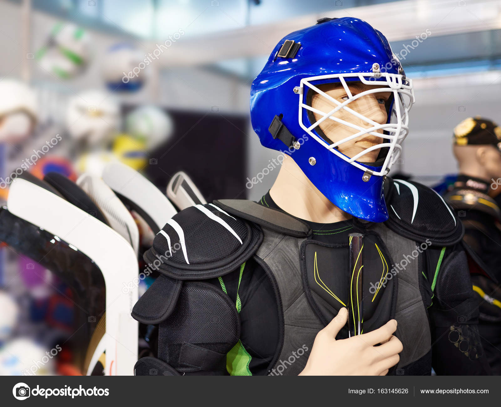 Mannequin in hockey equipment at sport shop Stock Photo by ©ryzhov 163145626