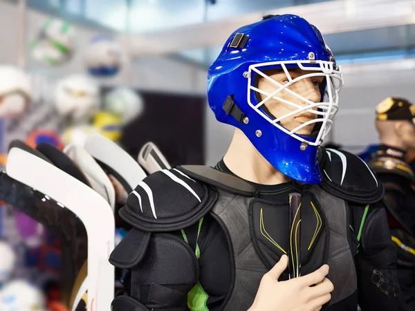 Mannequin in hockey equipment at sport shop