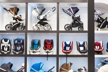 Store of baby carriages and car seats clipart