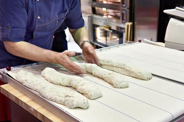 Baker cook dough for bread — Stock Photo, Image