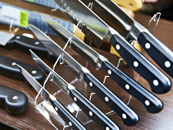 Kitchen knives on stand in store — Stock Photo, Image