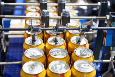 Beer can conveyor at factory clipart