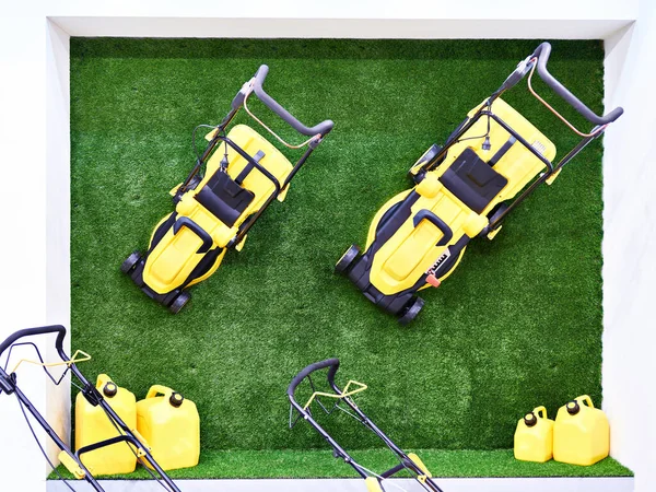 Lawn mowers on the grass — Stock Photo, Image