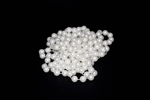 Pearls isolated on a black background — Stock Photo, Image