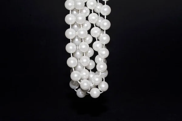 Pearls isolated on a black background — Stock Photo, Image