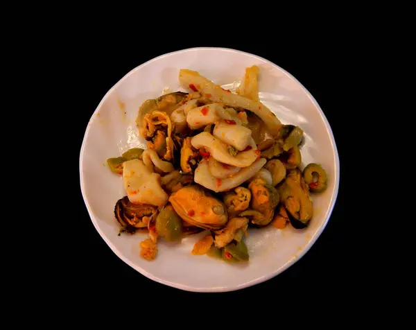 Seafood salad isolated on black�� the background — Stock Photo, Image