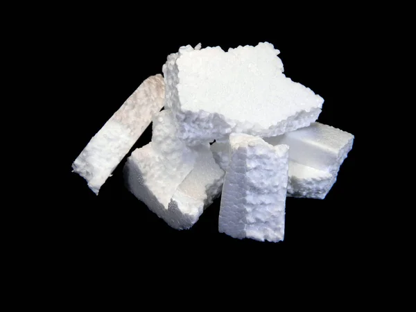 Polystyrene isolated on black background — Stock Photo, Image