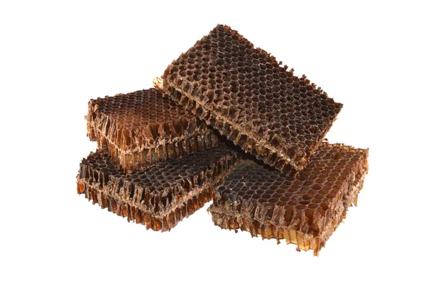 Abelha velha favo de mel isolado no fundo preto — Fotografia de Stock