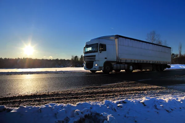 Truck delivery at sunset — Stock Photo, Image