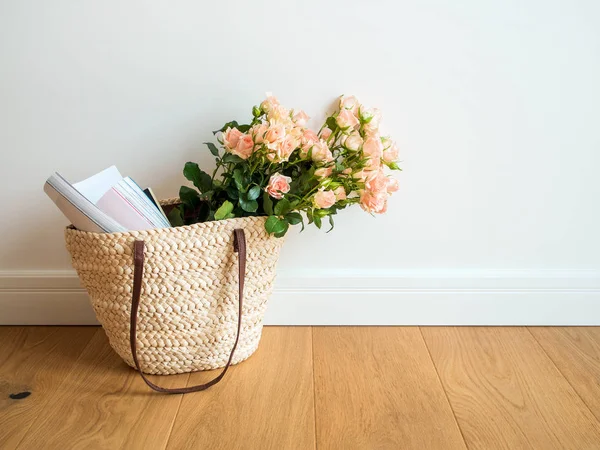 Rose Bouquet Magazines Wicker Bag Wooden Floor Royalty Free Stock Photos