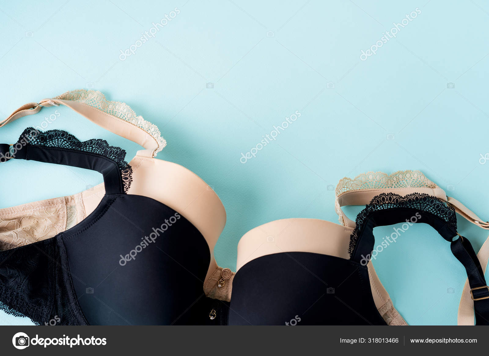 Top Fashionable Women's Brassiere Beige Black Color Turquoise Background Stock Photo by ©pinkasevich 318013466