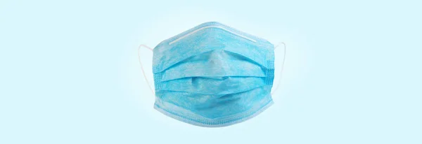 Beschermen Wegwerp Dokters Masker Gezicht Geïsoleerd Blauwe Achtergrond Antivirale Veiligheidsmaskers — Stockfoto