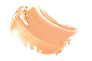 Sıvı fondöten lekeleri beyaz arka planda izole edilmiş. Makyaj için krem dokusu.