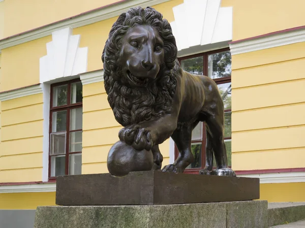 The lion guards the city manor in Novgorod. Russia.