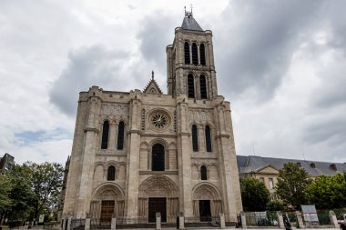 West facade of the Basilica Cathedral of Saint Denis, Paris clipart