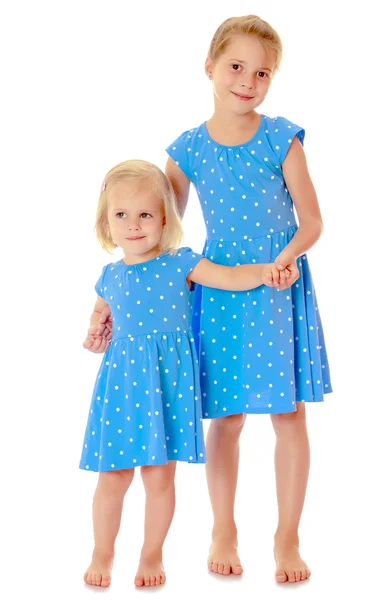 Sisters in blue dresses — Stock Photo, Image