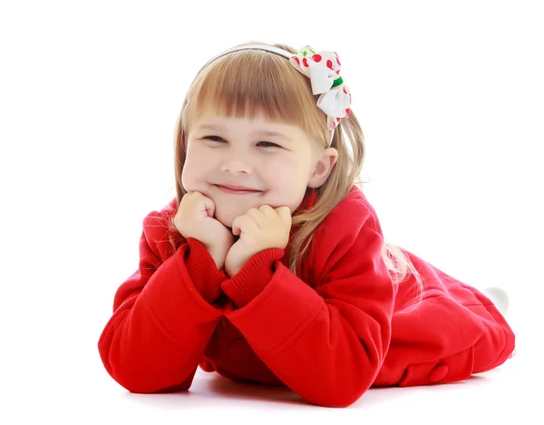 Menina feliz deitado no chão — Fotografia de Stock