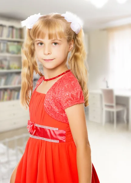 Little girl in orange dress — Stock Photo, Image