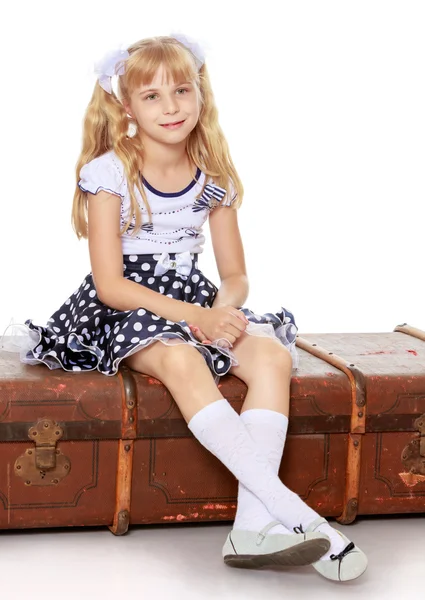 Girl with old suitcase — Stock Photo, Image