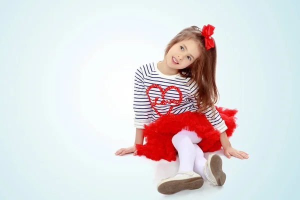 Little girl in red dress — Stock Photo, Image