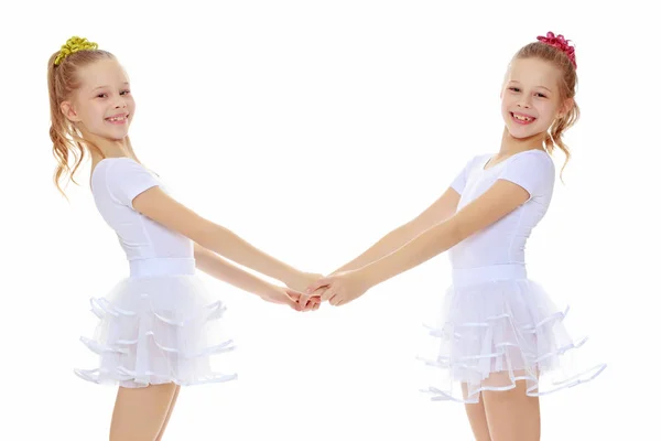 Cute girls holding hands — Stock Photo, Image