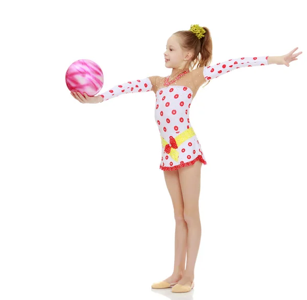 Gymnast does exercises with a ball — Stock Photo, Image