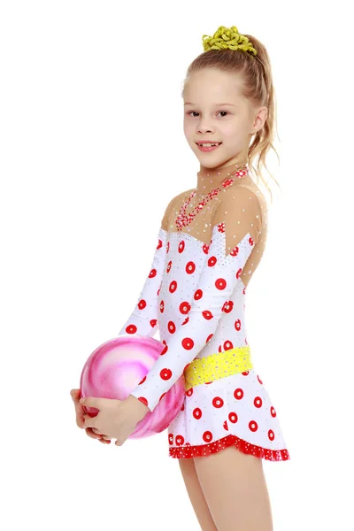 Gymnast does exercises with a ball — Stock Photo, Image